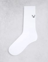 ASOS DESIGN - Sport-Socken in Weiß mit Funny-Face-Motiv
