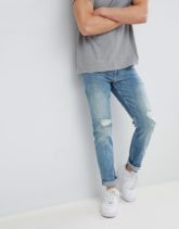 ASOS DESIGN - Schmale Stretch-Jeans mit Rissen in verwaschenem Mittelblau