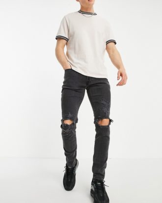 Abercrombie & Fitch - Besonders enge Jeans im Distressed-Look in verwaschenem Schwarz