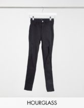 Hollister - Hourglass - Skinny Jeans mit Zierrissen in Schwarz