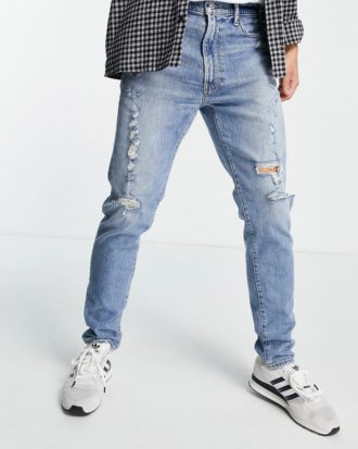 Abercrombie & Fitch - Schmal geschnittene, zerschlissene Jeans im Stil der 90er in heller Distressed-Optik-Blau